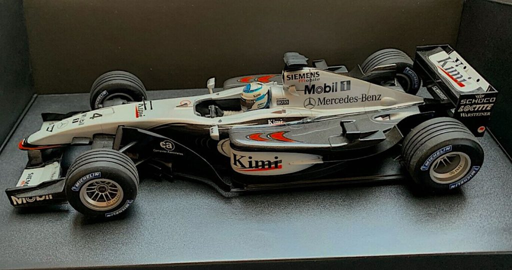 Minichamps McLaren MP4-17D Mercedes F1 1/18 - Kimi Räikkönen - Victoire Malaisie 2003